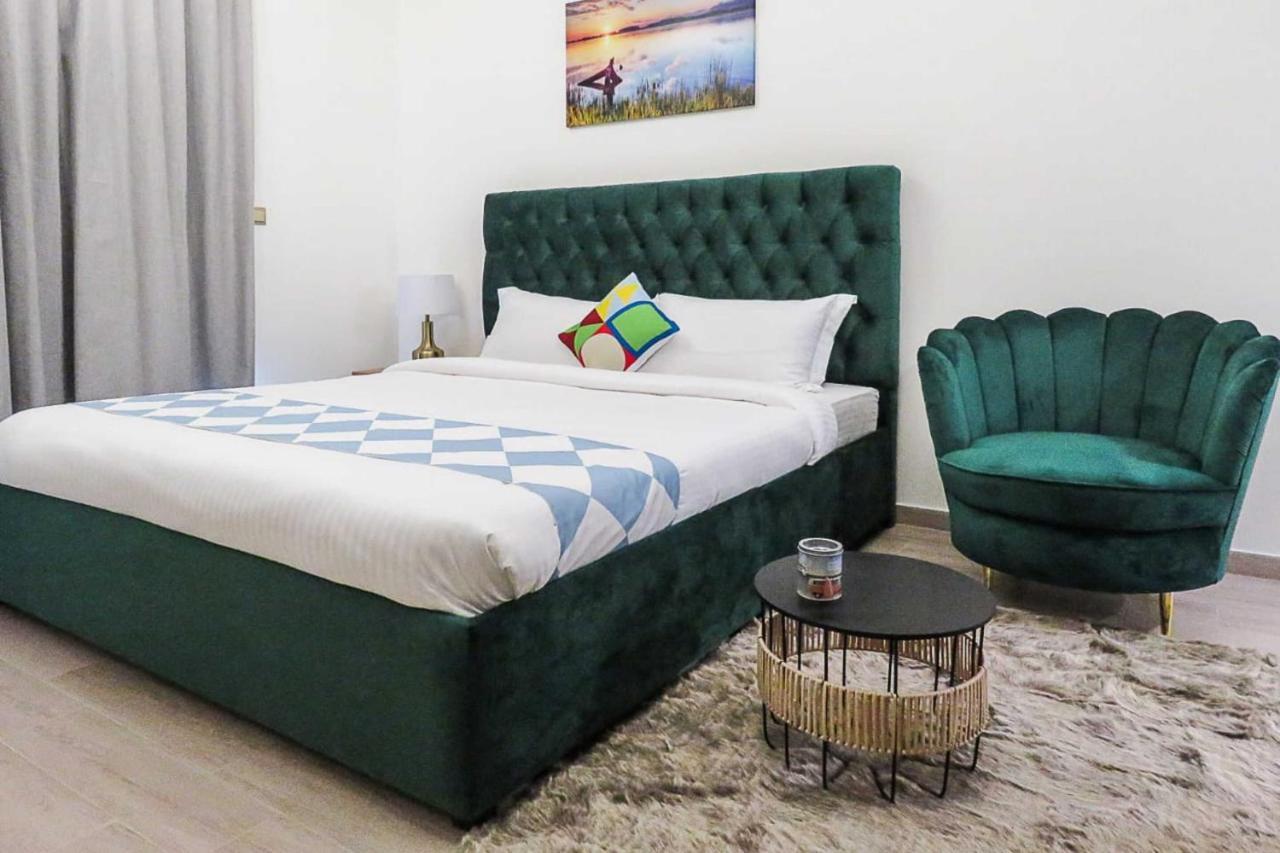 Oyo 860 Studio Apartment, Maya Tower 4, Jumeirah Village Triangle Дубай Экстерьер фото